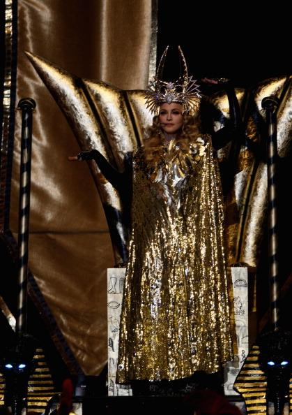 Madonna performs at the Superbowl wearing Givenchy with Bulgari jewels